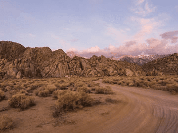 Scenic view of desert at dusk